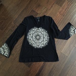 Black long sleeve top with flared sleeves